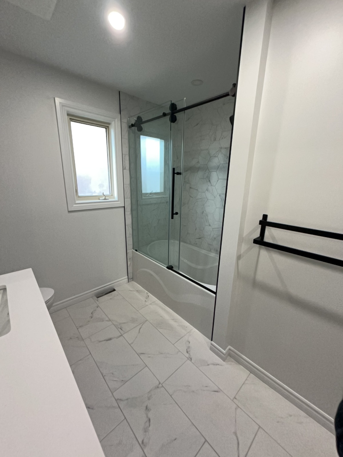 a bathroom shower and tub